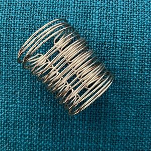 Modern stacked metal bracelet.